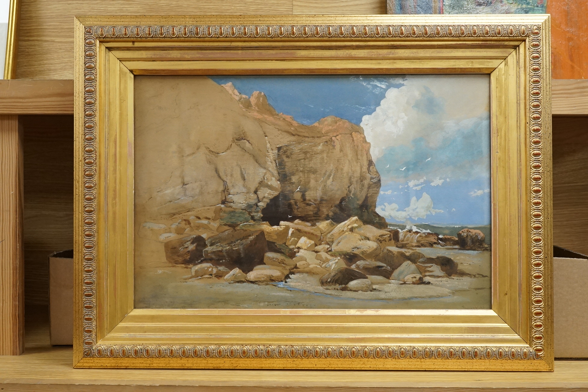 James Webb (1825-1895), heightened watercolour, Rocky coastal scene with cliffs and cave entrance, signed, 29 x 44cm, gilt framed. Condition - good